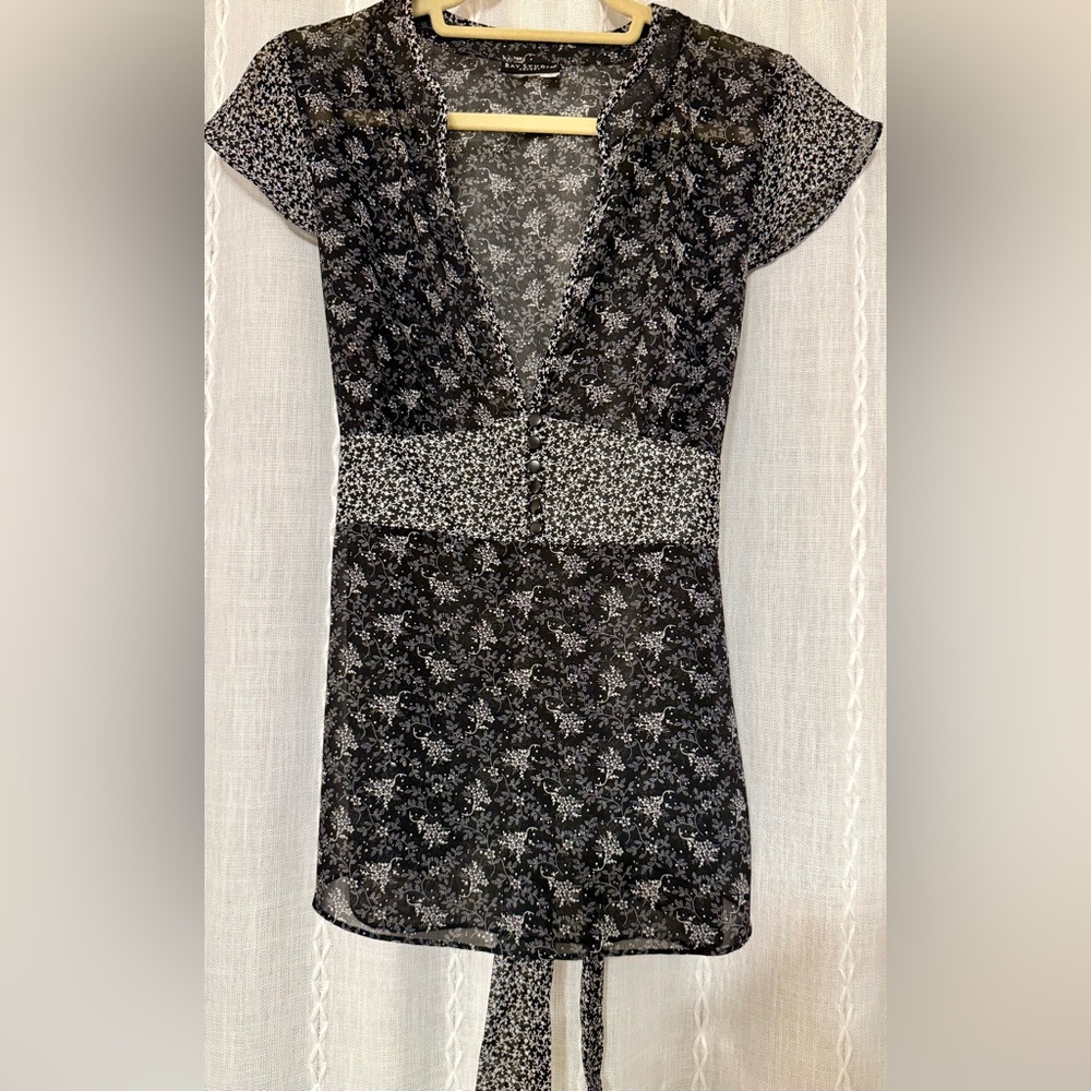 Bay Studio sheer black with white floral design blouse. Tie in back. Sz M.